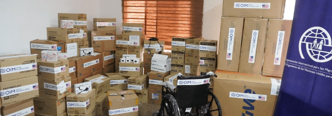 Cajas con donaciones etiquetadas por la OIM
