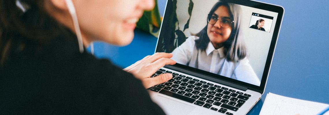 Woman receives online class through video conferencing app